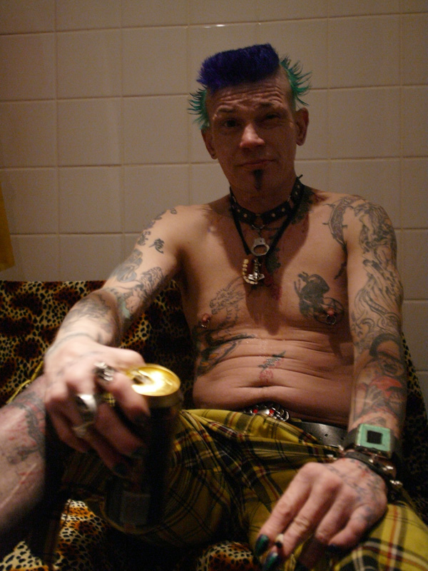 Backstage with Demented Are Go: Sparky shows us his tats